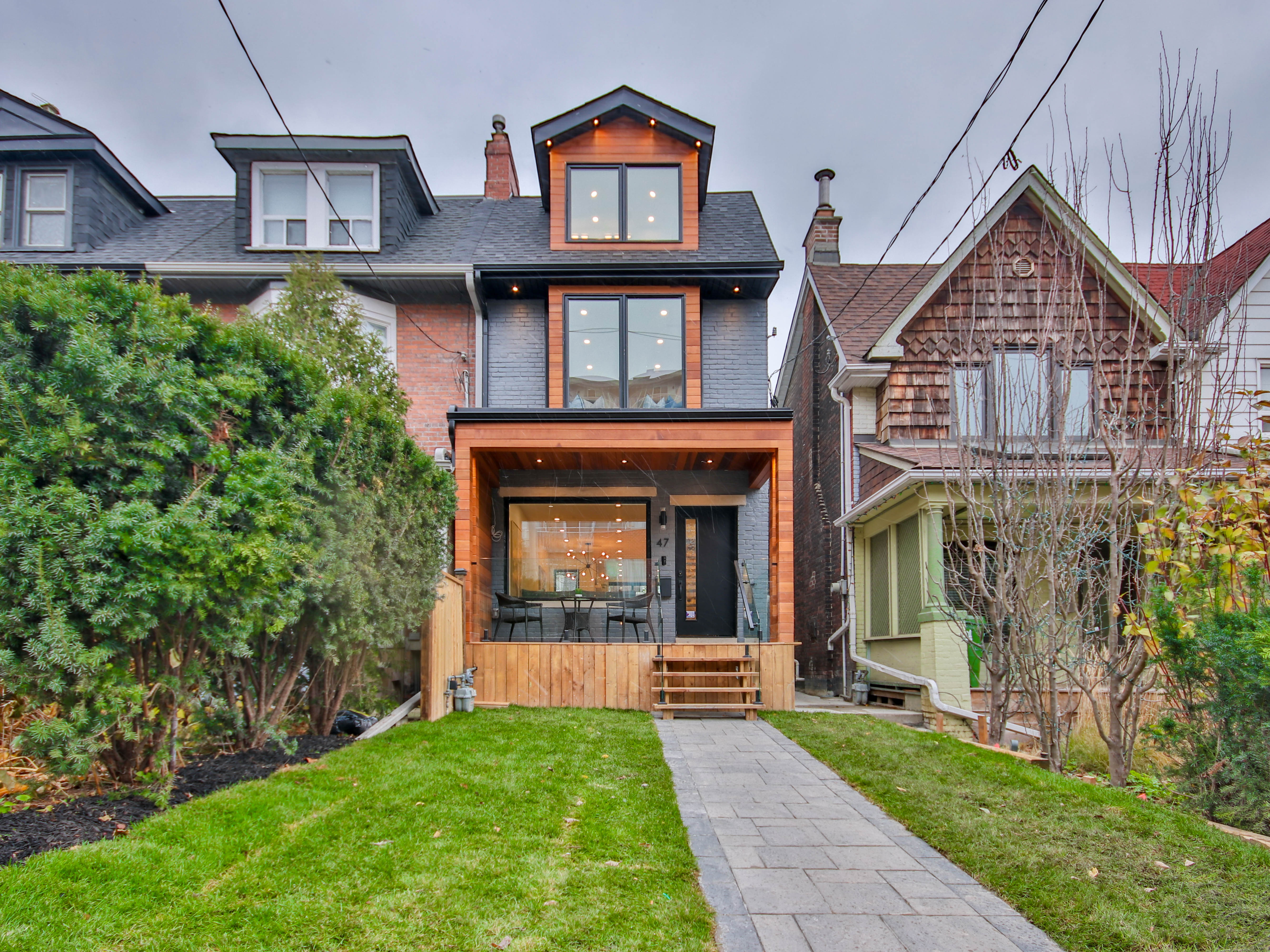 Exterior front view of a contemporary home with a strong square composition.